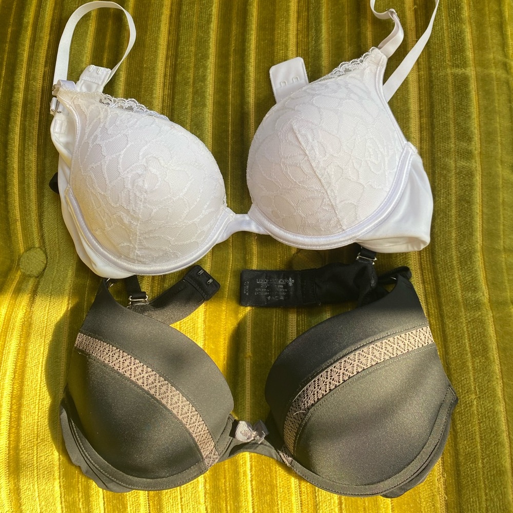 Two Lily of France extreme push-up bras.